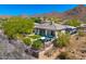 This aerial view shows the home and its outdoor seating area and patio at 12366 N 129Th St, Scottsdale, AZ 85259