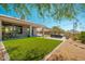 Well-maintained backyard features artificial turf, patio, and views at 12366 N 129Th St, Scottsdale, AZ 85259