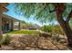 Backyard landscape with lush artificial turf and desert foliage and mountain view at 12366 N 129Th St, Scottsdale, AZ 85259