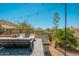 This patio features comfortable seating and mountain views at 12366 N 129Th St, Scottsdale, AZ 85259