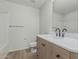 Updated bathroom features a modern vanity with marble countertop and a shower at 1265 S Aaron -- # 271, Mesa, AZ 85209