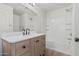 Stylish bathroom featuring modern vanity with marble countertop and a tub and shower combo at 1265 S Aaron -- # 271, Mesa, AZ 85209