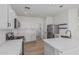 Well-equipped kitchen featuring stainless steel appliances, white cabinets, and quartz countertops at 1265 S Aaron -- # 271, Mesa, AZ 85209