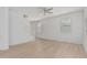 Open living area with wood floors, neutral paint, a ceiling fan, and a staircase to the second level at 1265 S Aaron -- # 271, Mesa, AZ 85209