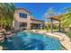 Enjoy a large private pool, spa and covered patio with outdoor kitchen in this backyard oasis at 1453 E Elgin Pl, Chandler, AZ 85225
