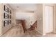 Hallway with carpet, stair railing and a set of pictures along the wall at 1453 E Elgin Pl, Chandler, AZ 85225