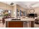 Open concept kitchen with granite countertops, stainless steel appliances, and natural light at 1453 E Elgin Pl, Chandler, AZ 85225