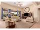 Bright and airy living room featuring comfortable furniture, neutral colors, and ample natural light at 1453 E Elgin Pl, Chandler, AZ 85225