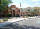 View of apartment buildings with manicured landscaping and convenient parking at 14575 W Mountain View Blvd # 711, Surprise, AZ 85374