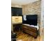 Living room showcases TV setup with built-in shelving and modern furniture at 14575 W Mountain View Blvd # 711, Surprise, AZ 85374