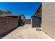 Spacious backyard featuring brick walls, a storage shed, and ample outdoor space for relaxing or entertaining at 1535 E Kenwood St, Mesa, AZ 85203