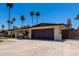 Single story home featuring an attached garage and a low maintenance landscaped yard at 1535 E Kenwood St, Mesa, AZ 85203