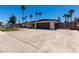 Single story home featuring an attached garage and a low maintenance landscaped yard at 1535 E Kenwood St, Mesa, AZ 85203