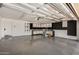 Spacious garage with built-in storage cabinets and ample room for parking and projects at 1535 E Kenwood St, Mesa, AZ 85203