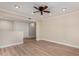 Bright living room featuring recessed lighting and modern flooring at 1535 E Kenwood St, Mesa, AZ 85203