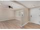 Bright living room featuring recessed lighting, modern flooring and window with shutters at 1535 E Kenwood St, Mesa, AZ 85203