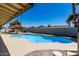 Beautiful backyard with a sparkling blue pool, perfect for relaxation and outdoor entertaining at 1535 E Kenwood St, Mesa, AZ 85203