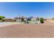 Large backyard with a basketball court, swimming pool, and ample space for outdoor activities at 15753 W Christy Dr, Surprise, AZ 85379