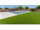 Spacious basketball court with artificial turf and a well-maintained playing surface at 15753 W Christy Dr, Surprise, AZ 85379