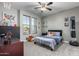 Cozy bedroom with natural light and fun decorations at 15753 W Christy Dr, Surprise, AZ 85379