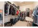 Spacious walk-in closet with abundant shelving and hanging space for organized storage at 170 E Canary Ct, San Tan Valley, AZ 85143