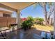 Covered patio featuring a built-in BBQ and views of the backyard garden, perfect for outdoor dining at 170 E Canary Ct, San Tan Valley, AZ 85143