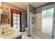 Bathroom featuring a shower-tub combo, neutral paint, and updated vanity at 1708 E Westchester Dr, Tempe, AZ 85283