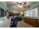 This bedroom features a bunk bed, ceiling fan, and lots of space at 1708 E Westchester Dr, Tempe, AZ 85283