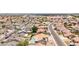 Aerial view of a neighborhood featuring backyard pools, and tree-lined streets at 1744 E Fremont Rd, Phoenix, AZ 85042