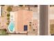 Overhead aerial view of home with backyard pool, solar panel and landscaped yard at 1744 E Fremont Rd, Phoenix, AZ 85042