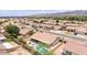 Aerial view of neighborhood homes with solar panels and private backyard pools at 1744 E Fremont Rd, Phoenix, AZ 85042