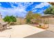 Large open backyard patio area with seating and wooden cabana structure at 1744 E Fremont Rd, Phoenix, AZ 85042