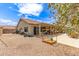 View of a backyard featuring a covered patio and play area, perfect for outdoor entertaining and Gathering fun at 1744 E Fremont Rd, Phoenix, AZ 85042