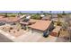 Aerial view of a single-Gathering home with tile roof and two car garage at 1744 E Fremont Rd, Phoenix, AZ 85042