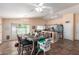 Dining area adjacent to the kitchen, featuring a rustic wood table and chairs, perfect for Gathering meals at 1744 E Fremont Rd, Phoenix, AZ 85042