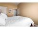 Bedroom featuring a bed, closet, wood floors, and ample natural light at 18650 N 91St Ave # 3301, Peoria, AZ 85382