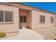 Charming front entrance featuring a walkway, covered entry, and desert landscaping at 18650 N 91St Ave # 3301, Peoria, AZ 85382