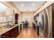 Well-equipped kitchen with stainless steel appliances and an open layout that flows seamlessly into the workspace at 18650 N 91St Ave # 3301, Peoria, AZ 85382