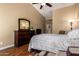 Relaxing main bedroom with a king-sized bed, dresser, and soft lighting, creating a tranquil atmosphere at 18650 N 91St Ave # 3301, Peoria, AZ 85382