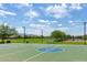 Community basketball court offering recreational play with neighborhood homes in the background at 18675 W Foothill Dr, Surprise, AZ 85387