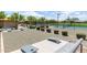 Community recreation area includes pickleball courts and cornhole offering opportunities for outdoor activities at 18675 W Foothill Dr, Surprise, AZ 85387