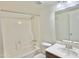 Bathroom featuring toilet, tub with shower, and a single sink vanity with mirror at 1927 E Hampton Ave # 260, Mesa, AZ 85204