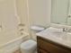 Bathroom featuring toilet, tub with shower, and a single sink vanity at 1927 E Hampton Ave # 260, Mesa, AZ 85204