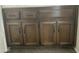 Close-up of the bathroom vanity featuring dark wood cabinets and hardware at 1927 E Hampton Ave # 260, Mesa, AZ 85204