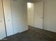 Bedroom showcasing closet doors, neutral walls and new carpet at 1927 E Hampton Ave # 260, Mesa, AZ 85204