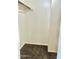 An empty, carpeted closet offers functional storage space at 1927 E Hampton Ave # 260, Mesa, AZ 85204
