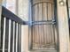 Front door with decorative security screen, address and lighting at 1927 E Hampton Ave # 260, Mesa, AZ 85204