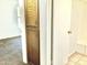 Hallway to bedroom features built in shelving and access to adjacent room at 1927 E Hampton Ave # 260, Mesa, AZ 85204