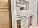 Functional kitchen featuring ample cabinetry, stove and oven combination and a bright, clean aesthetic at 1927 E Hampton Ave # 260, Mesa, AZ 85204