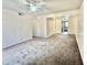 Spacious living room featuring neutral carpet and bright natural light. This room is ready for new memories at 1927 E Hampton Ave # 260, Mesa, AZ 85204